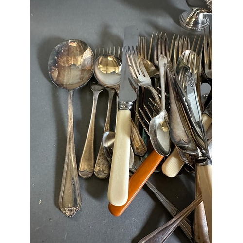 756 - A volume of silverplated items along with flatware etc.