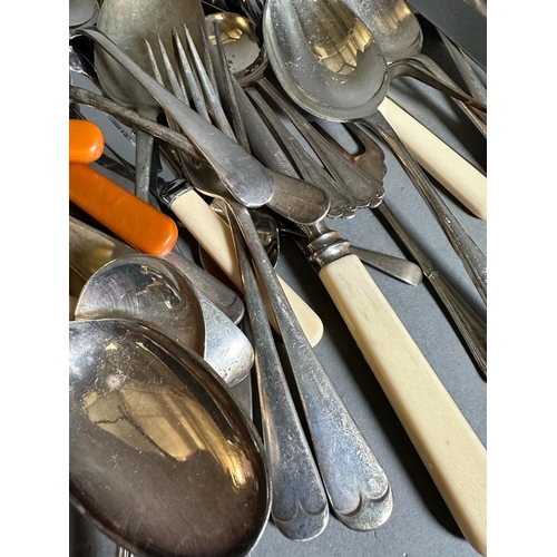 756 - A volume of silverplated items along with flatware etc.