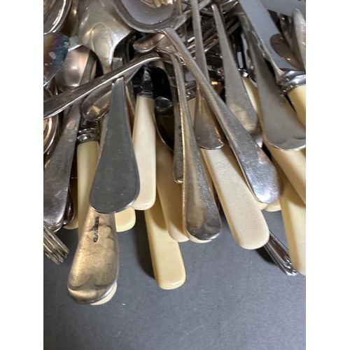 756 - A volume of silverplated items along with flatware etc.