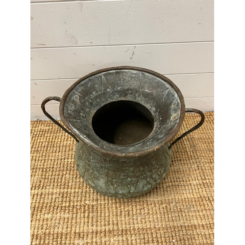 761 - A hammered copper two handled pot (H62cm Dia 32cm)