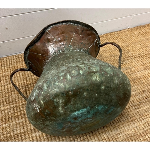 761 - A hammered copper two handled pot (H62cm Dia 32cm)