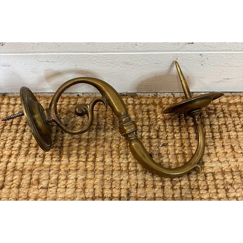 762 - A pair of vintage brass candle sconces and a Regency door pull