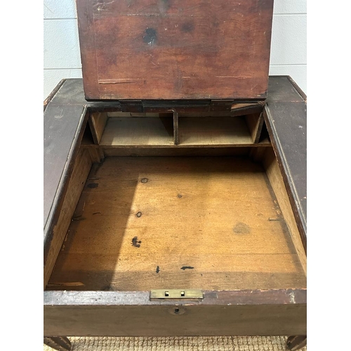 78 - A mahogany desk top with hinged lid revealing storage and pigeon holes (H48cm W63cm D58cm)