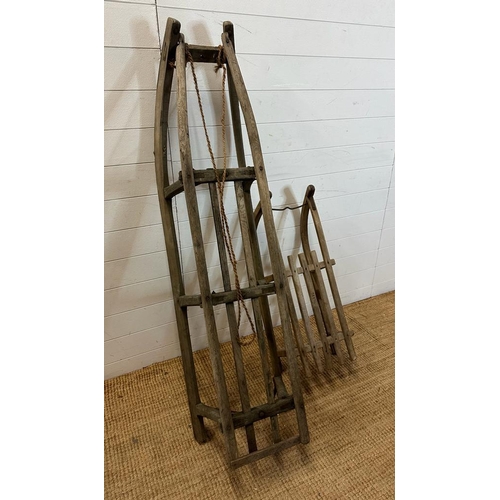 783 - Two vintage Bentwood sledges, one stamped 