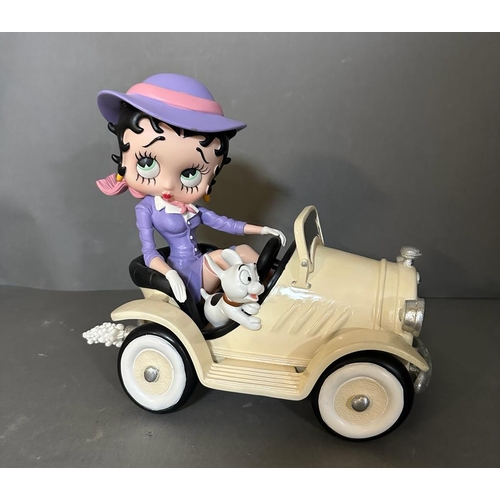 793 - A collectable Betty Boop car and figure.