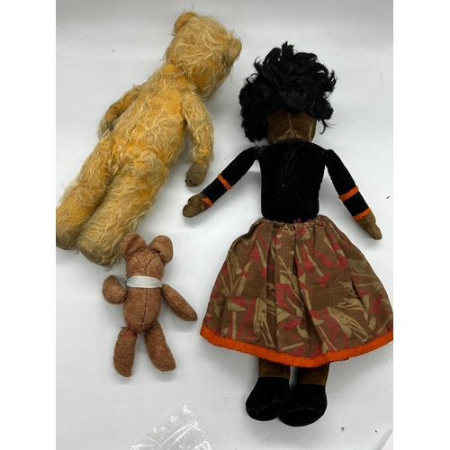 796 - Two classic teddy bears and one rag doll