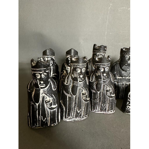 797 - A selection of Isle of Lewis black and white chess pieces to include Kings, Queens, Bishops, Knights... 