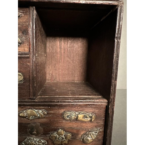 83 - A Meji period style Japanese table top cabinet with brass and copper decoration (H21cm)