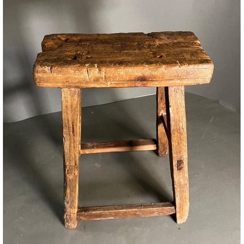 97 - A rustic wooden stool (leg AF) (H49cm W39cm)