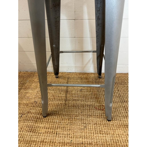 99 - A set of four metal Bistro stools