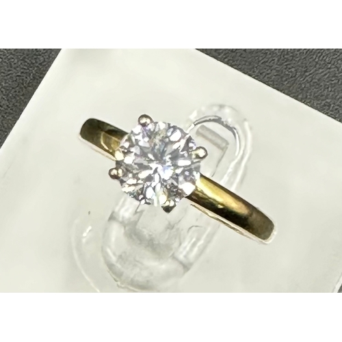 555B - A Diamond set single stone ring, round brilliant cut diamond measuring 6.65mmx 6.64mm x 4.2mm depth,... 