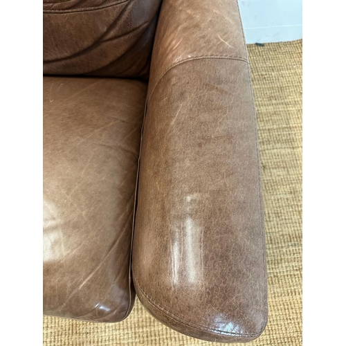 1 - A pair of brown leather club arm chairs