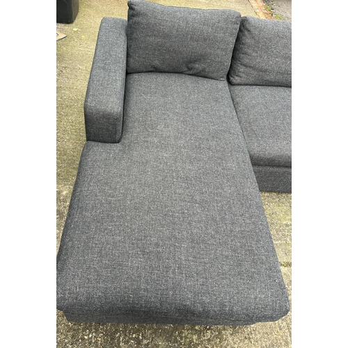 100 - A corner sofa upholstered in a grey highland tweed by sofa.com