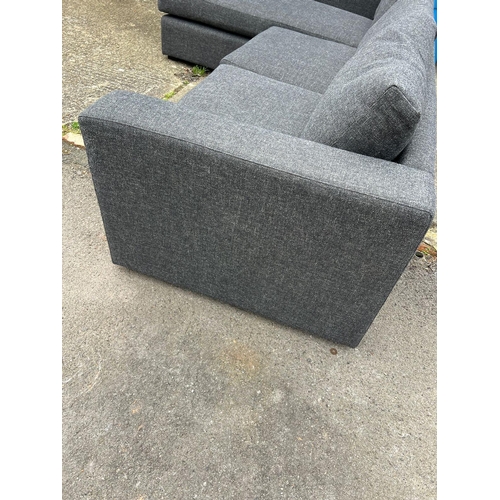 100 - A corner sofa upholstered in a grey highland tweed by sofa.com