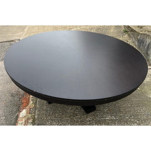 102 - A contemporary black circular dining table on turned centre base (H75cm Dia189cm)