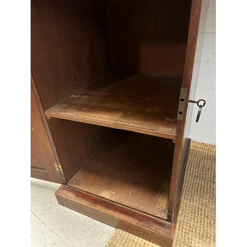 106 - A Victorian mahogany breakfront pedestal sideboard, comprising of central drawers flanked by cupboar... 