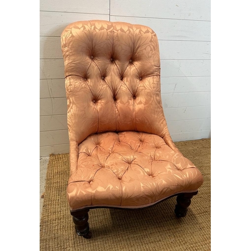 107 - A mahogany framed button back bedroom chair upholstered in pink