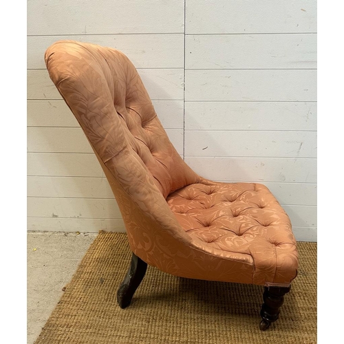 107 - A mahogany framed button back bedroom chair upholstered in pink