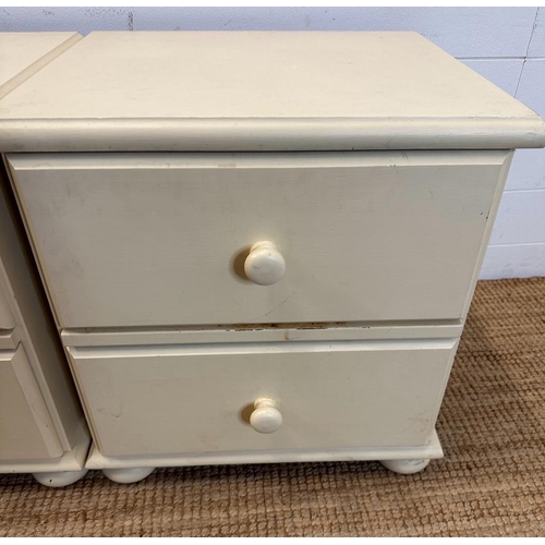 126 - A pair of white painted two drawer bedside tables on bun feet (H53cm W51cm D43cm)