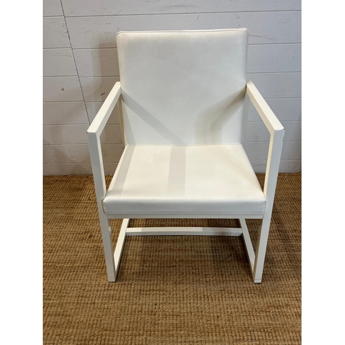 129 - A white open armchair by Casabella