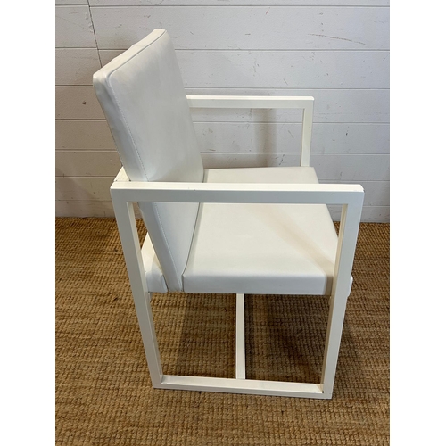 129 - A white open armchair by Casabella