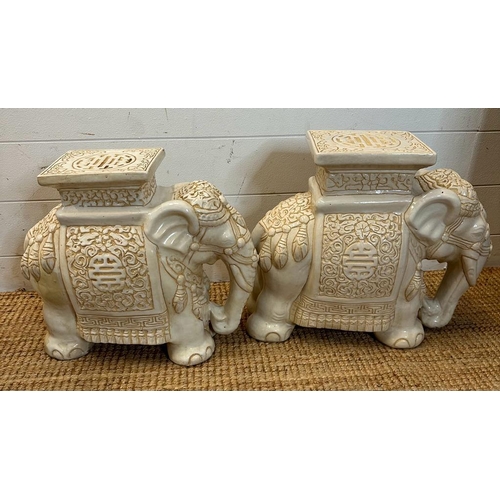 130 - Two white ceramic elephant themed plant stands (H37cm and H39cm)