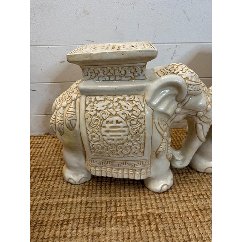 130 - Two white ceramic elephant themed plant stands (H37cm and H39cm)