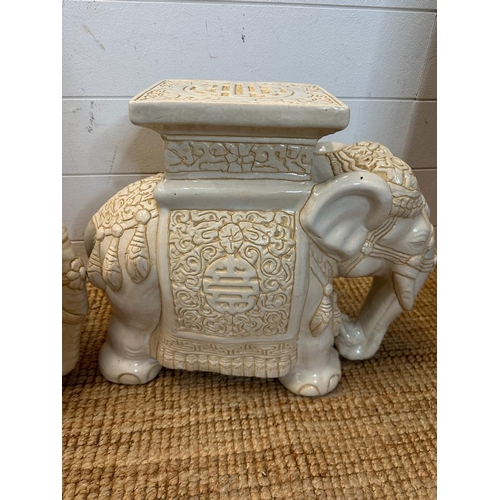 130 - Two white ceramic elephant themed plant stands (H37cm and H39cm)