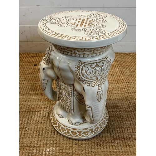 131 - A white ceramic pierced elephant themed plant stand H44cm