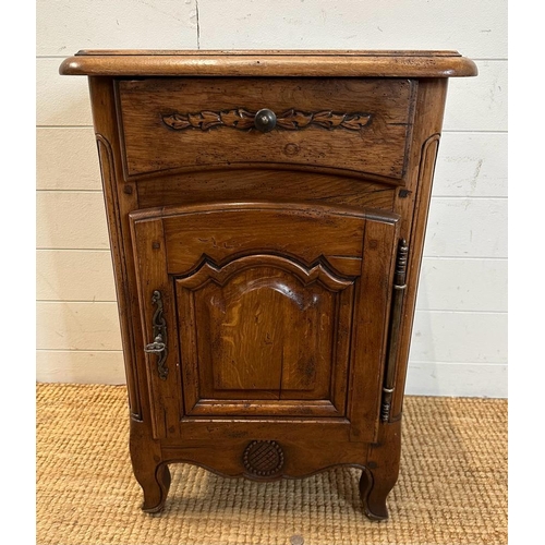 132 - An oak single drawer French style bedside cabinet