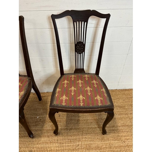 137 - Two mahogany slat back Edwardian style chairs