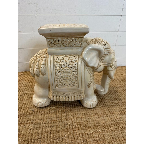 139 - A ceramic white elephant style pierced plant stand