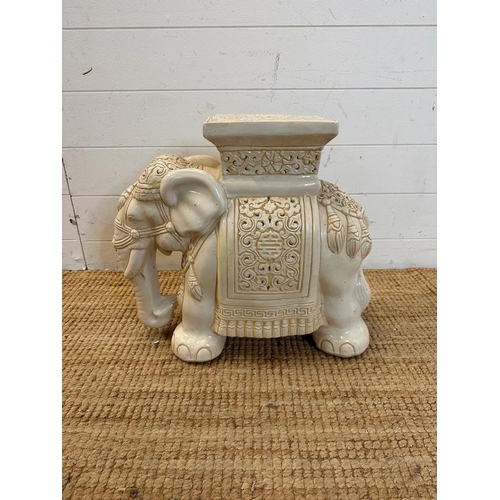 139 - A ceramic white elephant style pierced plant stand