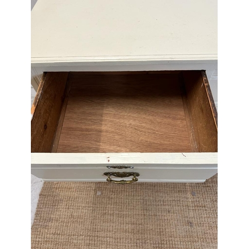 140 - A white painted two over three chest of drawers (H78cm W99cm D45cm)