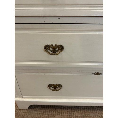 140 - A white painted two over three chest of drawers (H78cm W99cm D45cm)