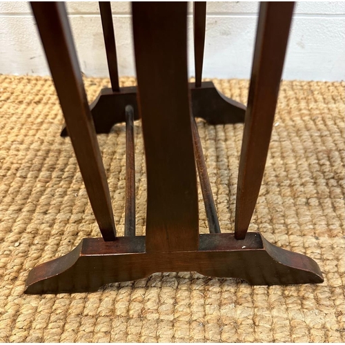 144 - A mahogany folding four tier cake stand