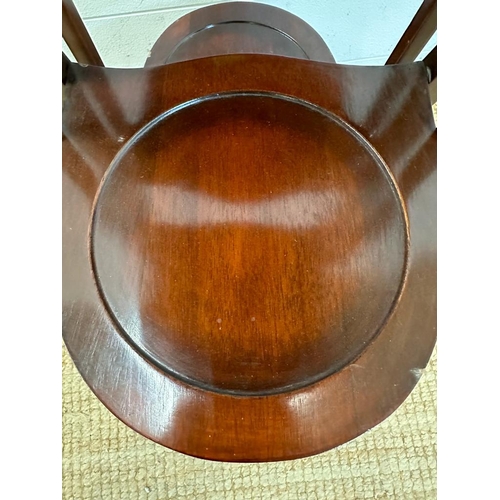 144 - A mahogany folding four tier cake stand