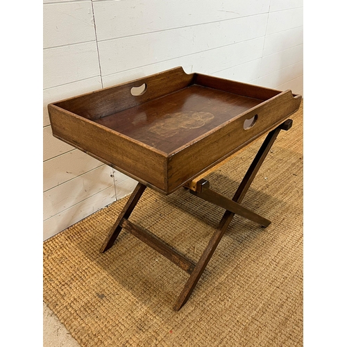 15 - A butler tray table on folding frame (H62cm W72cm D49cm)