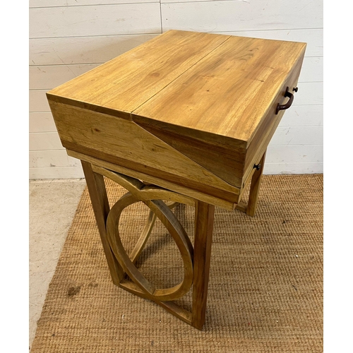 152 - An oak style pull out writing desk (H90cm W70cm D56cm)