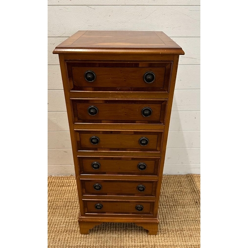 159 - A Yew six drawer tall boy (H89cm W38cm D37cm)