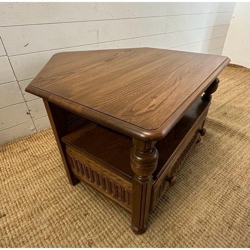 170 - An Ercol side or corner cabinet with single drawer under and drop leaf (H48cm W74cm D46cm)