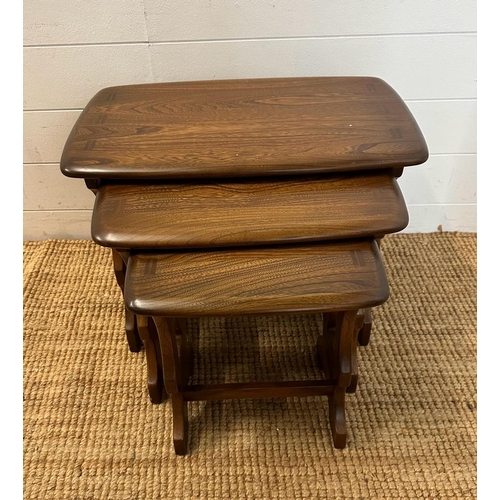 172 - A nest of three Mid Century side table (H42cm W58cm D55cm)