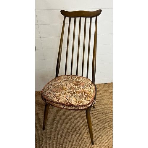 180 - A dark Ercol dining table and five Ercol Windsor Goldsmith dining chairs (H72cm W147cm D84cm)