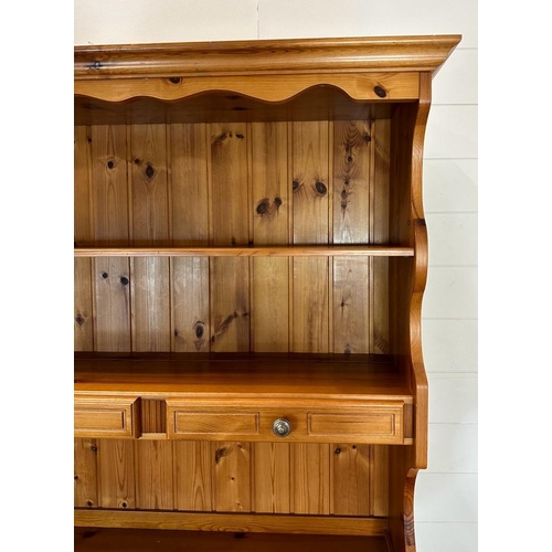 184 - A pine two drawer two cupboard dresser with a two drawer plate rack over (H185cm W97cm D44cm)