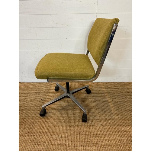 186 - A Mid Century chrome office chair in a green upholstery on castors