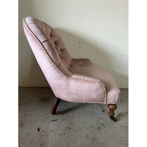 195 - A Victoria button back slipper or nursing chair and matching foot stool