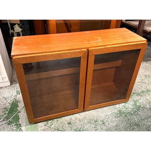 199 - A G plan display unit. Three drawers and glazed cupboard over with two glazed wall hanging cupboards... 