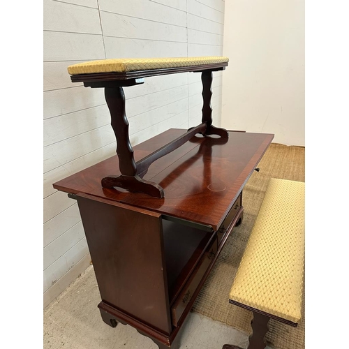 201 - A flamed mahogany metamorphic dining table with two drawers under and two upholstered benches AF