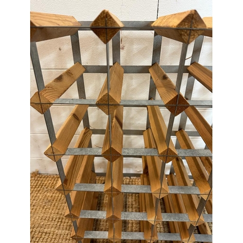 22 - A wooden thirty six bottle wine rack