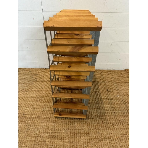 22 - A wooden thirty six bottle wine rack